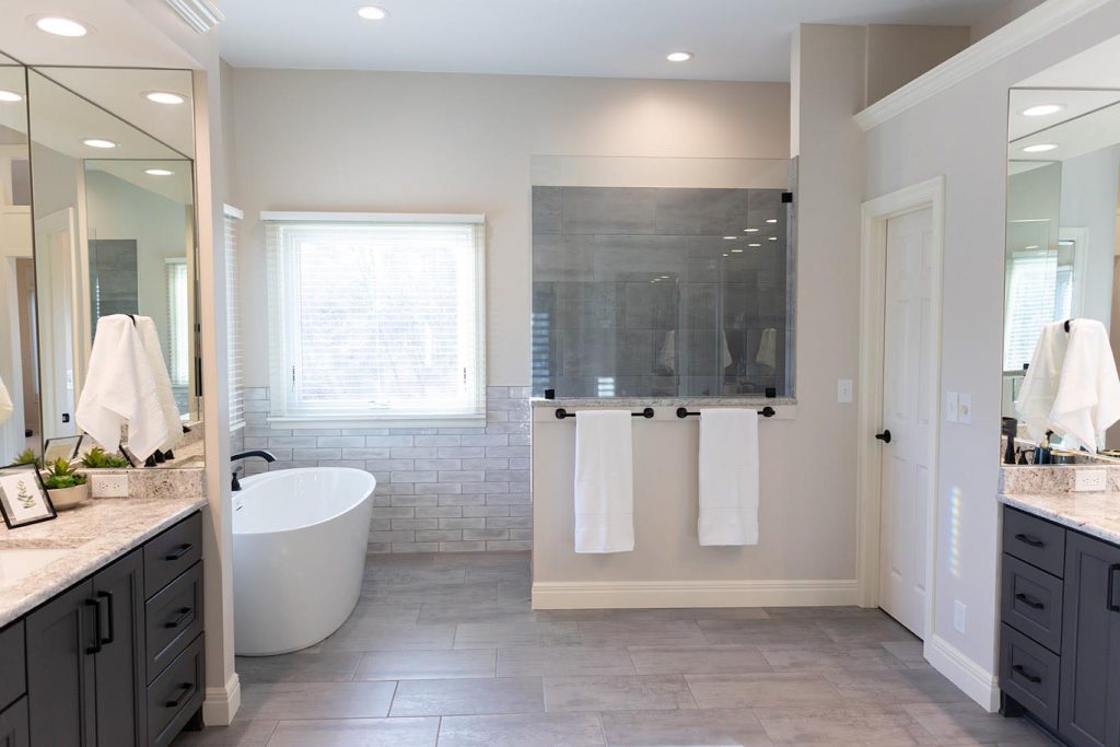 Custom bathroom remodel with freestanding tub and walk-in shower in a Topeka home