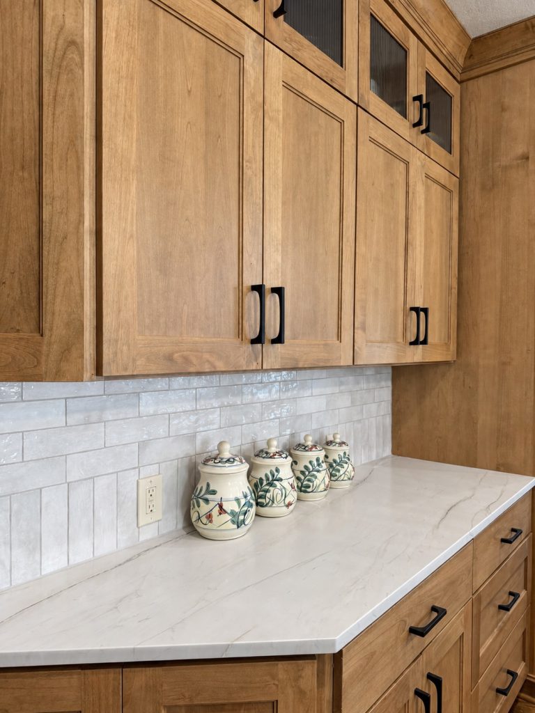 Mont Blanc quartzite countertop and tile backsplash detail in a remodeled Kansas City kitchen